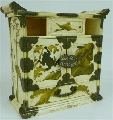 Lot 190 - A Japanese Ivory, Lacquered and Metal Mounted Miniature Shodana, late Meiji period (1868-1912), the