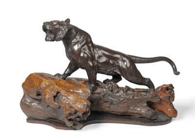 Lot 191 - A Japanese Bronze Large Figure of a Prowling Tiger, Meiji period (1868-1912), with well...