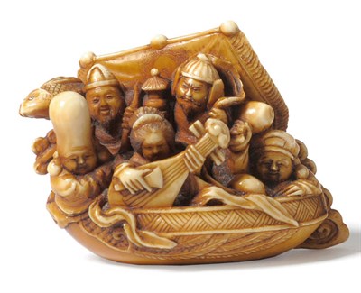 Lot 195 - A Japanese Carved Elephant Ivory Netsuke of the Takarabuni, late Meiji period (1868-1912), the...