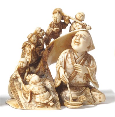 Lot 196 - A Japanese Carved Elephant Ivory Figurative Netsuke, late Meiji period (1868-1912), as a...