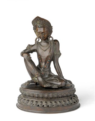 Lot 221 - A Nepalese Figure of Manjusri, 18th/19th century, seated on a lotus pericarp, hands in mudra,...