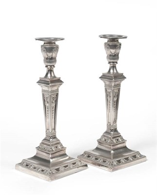Lot 272 - A Pair of Victorian Electroplate Candlesticks, circa 1880, the square bases rising to flared...