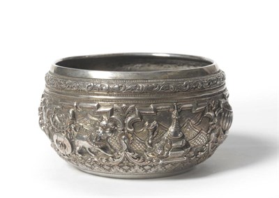 Lot 288 - A White Metal Repoussé Silver Thabeik Bowl, Burma, circa 1870, worked in high relief with...