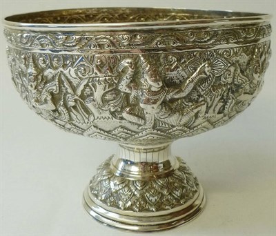 Lot 289 - A Burmese White Metal Bowl, circa 1890, the pedestal foot supporting a circular bowl chased...