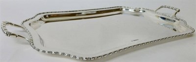Lot 299 - A George V Tray, Fenton Bros Ltd, Sheffield 1926, shaped rectangular with twin loop handles and...