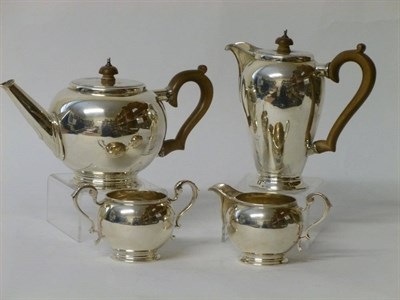 Lot 304 - A George V Four Piece Teaset, Daniel George Collins, London 1928, in 18th century style, the teapot