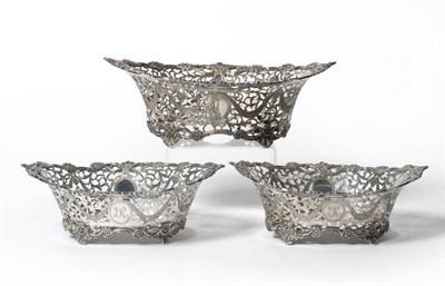 Lot 315 - An Edward VII and Later Suite of Three Baskets, Charles Stuart Harris, London 1904/09/12, of flared