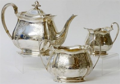 Lot 316 - An Edward VII Three Piece Teaset, Atkin Bros, Sheffield 1908, of shaped oval baluster form with...