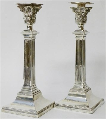 Lot 328 - A Pair of Victorian Neo-Classical Table Candlesticks, Henry Harrison, Sheffield 1885, each with...