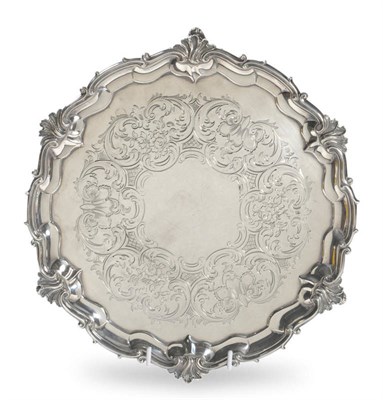 Lot 335 - A Victorian Salver, Edward Barnard & Sons, London 1845, shaped circular with foliate scroll and...