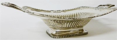 Lot 360 - A George III Two-Handled Basket, maker's mark W & PC, Edinburgh 1812, of rounded rectangular shape