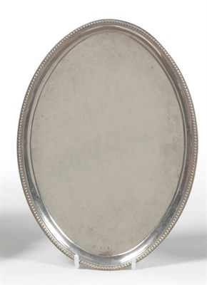 Lot 368 - A George III Salver, Hannam & Crouch, London 1791, plain oval with beaded rim and four bracket...