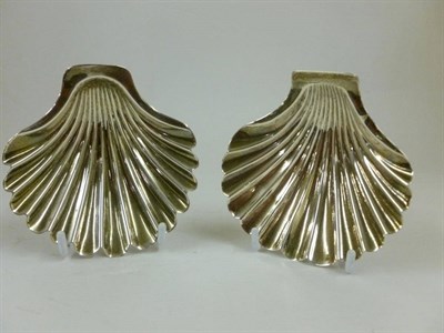 Lot 370 - Two George III Butter Shells, Thomas Heming, London 1762 and 1777, modelled as plain scallop shells