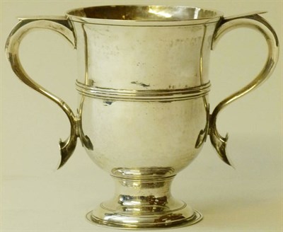 Lot 375 - A George II Loving Cup, John Payne, London 1759, the girdled semi-ovoid bowl with S scroll handles