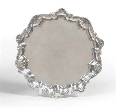 Lot 376 - A George III Waiter, Richard Rugg, London 1760, shaped circular with shell and scroll rim, all...