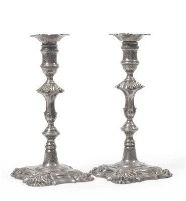 Lot 378 - A Pair of George II Candlesticks, John Cafe, London 1754, cast shell and scroll pattern with...