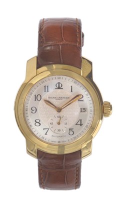 Lot 408 - An 18ct Gold Automatic Calendar Wristwatch, signed Baume & Mercier, Geneve, circa 2000,...