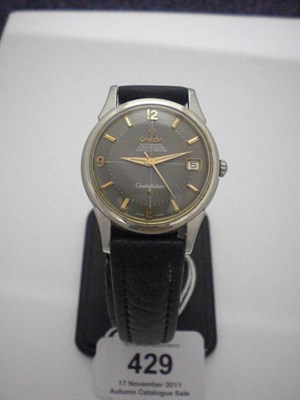 Lot 429 - A Stainless Steel Automatic Calendar Centre Seconds Wristwatch, signed Omega, model: Constellation