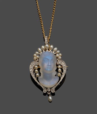 Lot 461 - An Art Nouveau Brooch/Pendant, a carved moonstone as a maiden's head, within a diamond and seed...