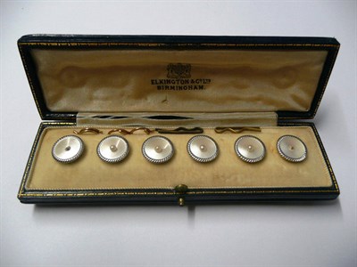 Lot 473 - A Set of Six Dress Buttons, mother-of-pearl disks centred by a seed pearl within a white rope twist