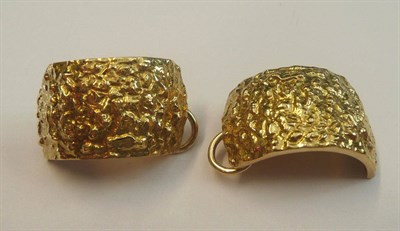 Lot 475 - A Pair of Earrings, of cuff style, in textured form, with clip fittings