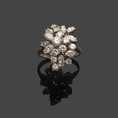 Lot 482 - An 18 Carat White Gold Diamond Spray Cluster Ring, comprising round brilliant cut and marquise...