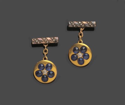 Lot 487 - A Pair of Russian Cufflinks, an old cut diamond within a border of cabochon sapphires, chain linked