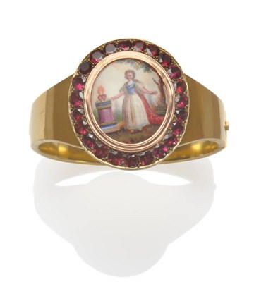 Lot 497 - A Victorian Bangle, with central oval plaque painted with a miniature of a pretty young woman...