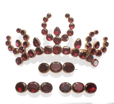 Lot 504 - A Victorian Coronet Brooch, set with foil backed garnets, measures 8.1cm by 3.4cm and Three...