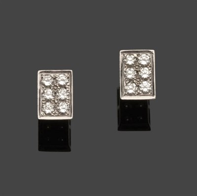 Lot 512 - A Pair of 18 Carat White Gold Diamond Cluster Earrings, round brilliant cut diamonds in claw...