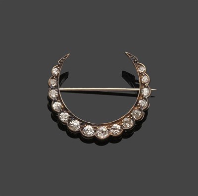 Lot 545 - A Late Victorian Diamond Crescent Brooch, of graduated old cut diamonds, in collet settings,...