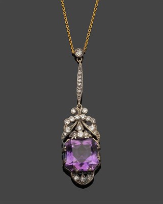 Lot 546 - An Amethyst and Diamond Pendant on Chain, the octagonal amethyst set within a pierced frame of...