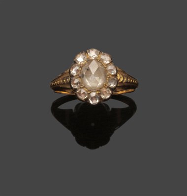 Lot 551 - A Georgian Rose Cut Diamond Cluster Ring, the diamonds claw set in closed back mounts, to a...