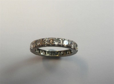 Lot 569 - A Diamond Full Eternity Ring, round brilliant cut diamonds in white claw settings, total...