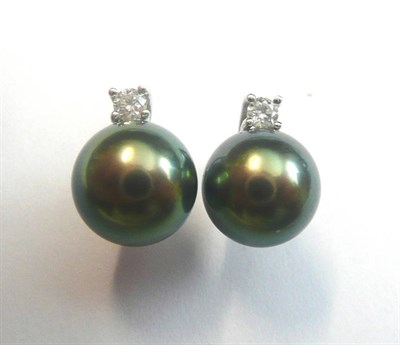 Lot 573 - A Pair of 18 Carat White Gold Green Cultured Pearl and Diamond Earrings, the pearl in a cup,...