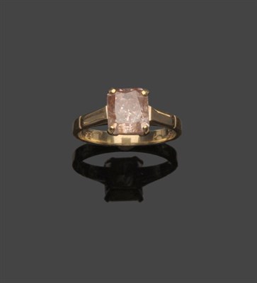 Lot 578 - A Light Pink Diamond Solitaire Ring, the radiant cut diamond in a yellow four claw setting, to...