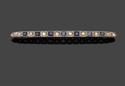 Lot 605 - A Sapphire and Diamond Bar Brooch, square sapphires alternate with brilliant cut diamonds, in white