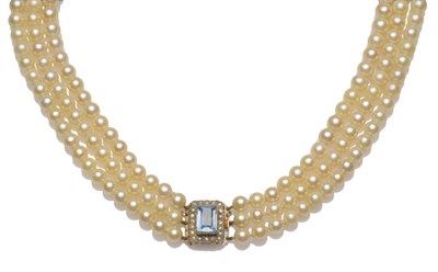 Lot 654 - A Three Row Cultured Pearl Necklace, the 58:65:69 graduated pearls strung to a cluster clasp of...