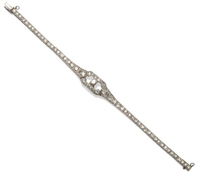 Lot 661 - An Art Deco Diamond Bracelet, the articulated bracelet of geometric form and set throughout...