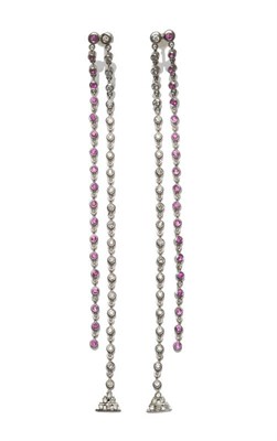 Lot 662 - A Pair of Diamond and Pink Sapphire Earrings, round brilliant cut stones in white chain linked...