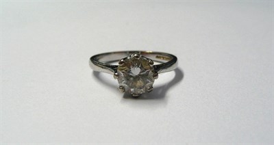 Lot 666 - A Platinum Diamond Solitaire Ring, a round brilliant cut diamond, in an eight claw setting to a...