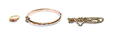 Lot 68 - A 9 carat gold bangle, a trace link chain stamped '9CT', length 41cm and an 18 carat gold synthetic