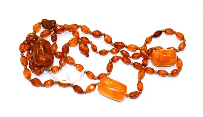 Lot 79 - An amber bead necklace, drop length 14cm, necklace length 90cm