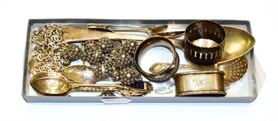 Lot 80 - A small quantity of silver teaspoons, a serving spoon, napkin rings, child's bracelet,...