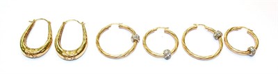 Lot 95 - Three pairs of 9 carat gold hoop earrings, various designs