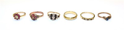 Lot 101 - A garnet and opal cluster ring, unmarked, finger size Q, a 9 carat gold gem set ring, finger...