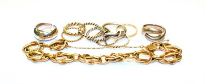 Lot 104 - A fancy link bracelet, indistinctly marked, length 21cm, four 9 carat gold band rings, of...