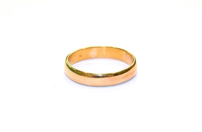 Lot 109 - A 22 carat gold band ring, finger size U