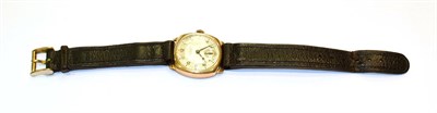 Lot 115 - A 9 carat gold cushion shaped wristwatch, signed Cyma, retailed by Collingwood, with...