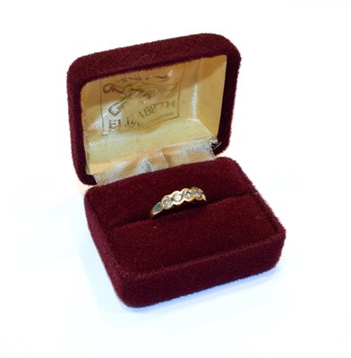 Lot 127 - An 18 carat white gold diamond five stone ring, finger size N